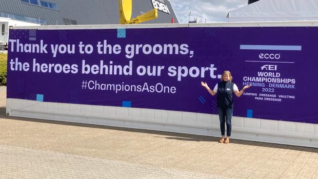 The International Grooms Association’s banner pictured at the World Championships