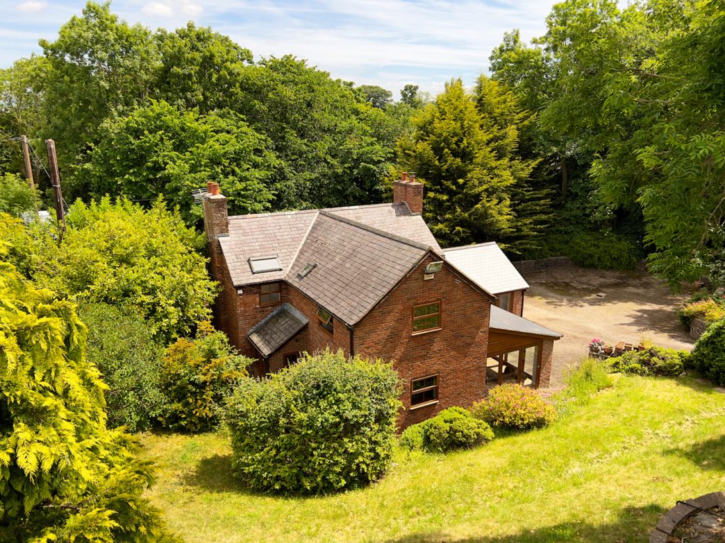 A rural country home boasting 6 acres, an outdoor school, 3 stables and ...