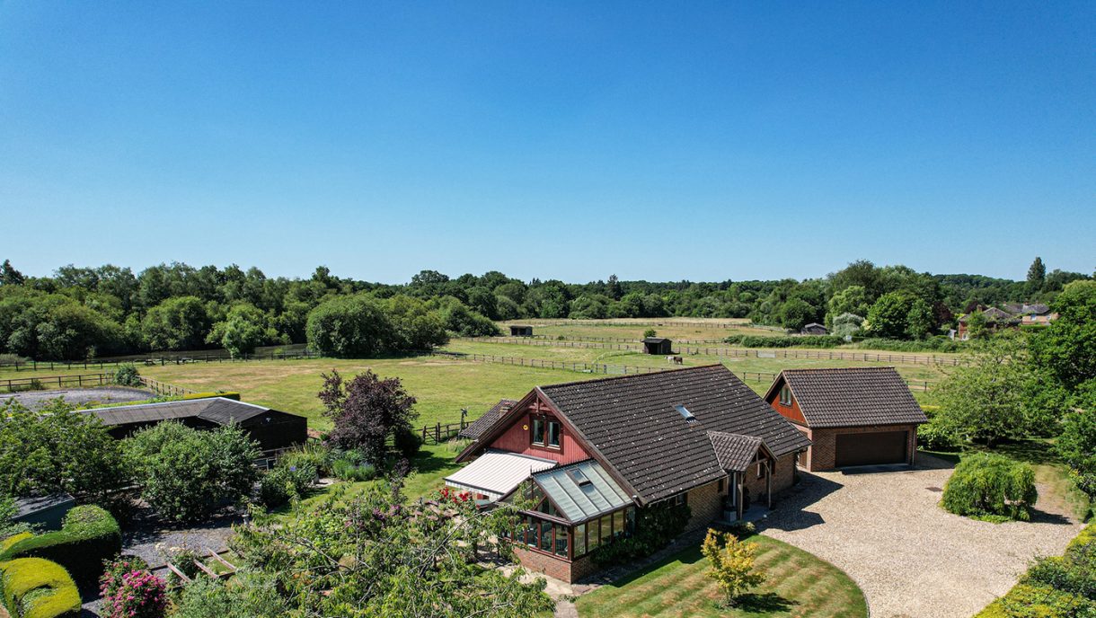 A rural country home boasting 6 acres, an outdoor school, 3 stables and ...