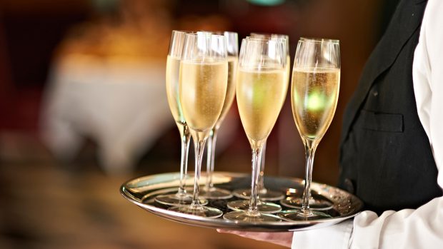 Champagne being served at a hunt ball