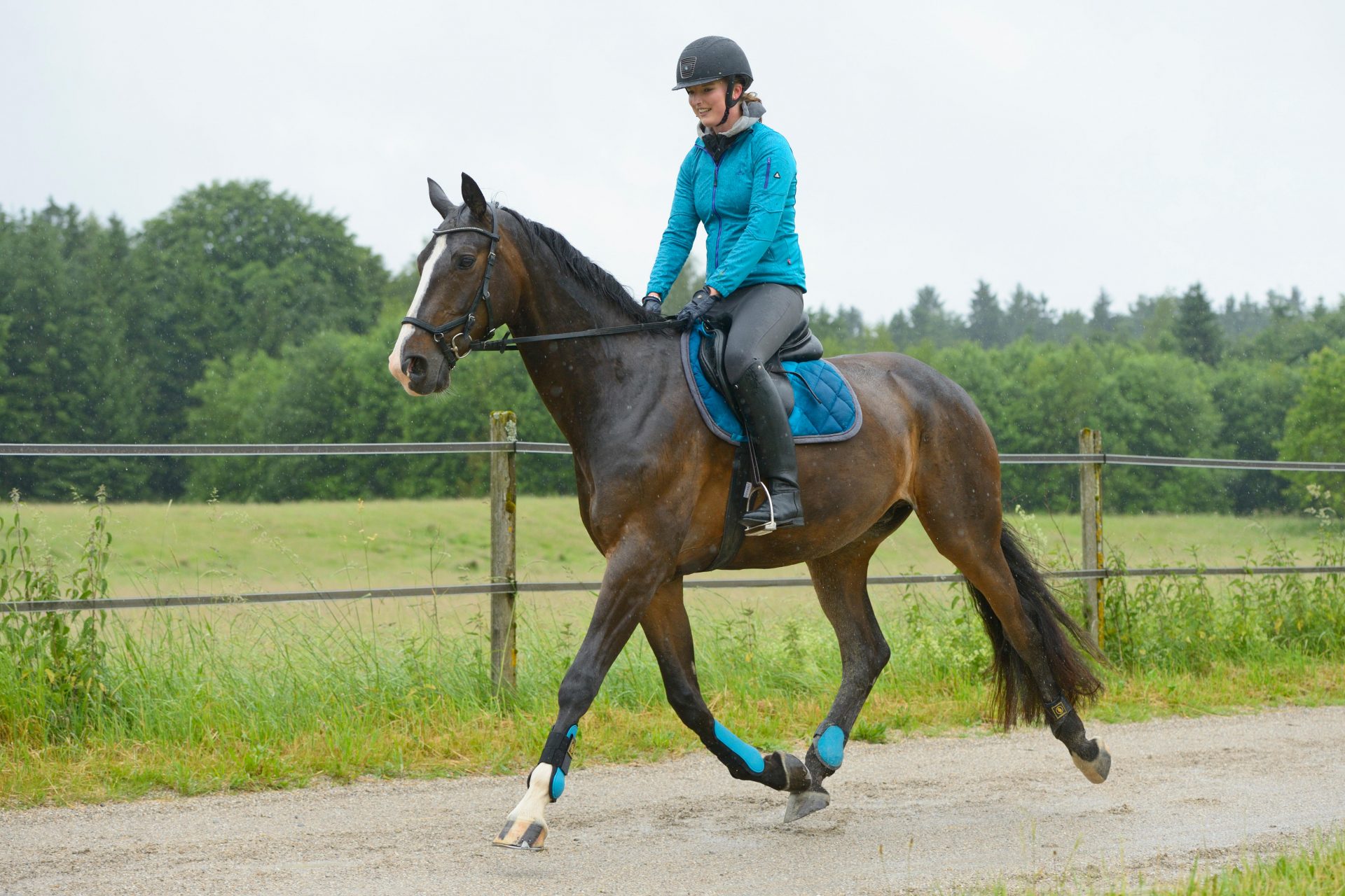 Horse riding in the rain keeping dry and protecting the tack