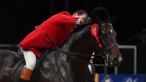 View Point and Robert Walker on their way to winning the show hunter championship at HOYS 2022