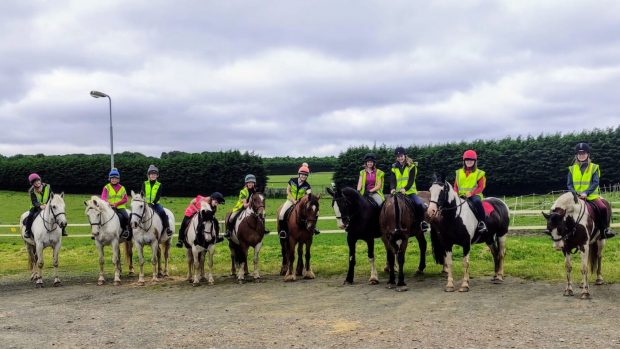 Horses and riders pictured at Tower Farm riding school, which has celebrated its 50th birthday