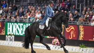 Marc Peter Spahn and Friesian stallion Elias at London International Horse Show 2022