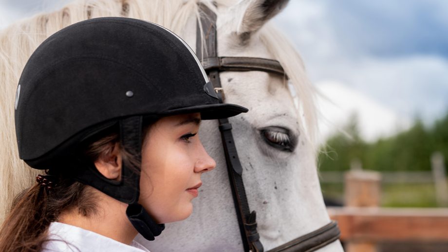 Rider with horse wearing one of the best riding hats