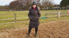 LeMieux Loire Waterproof Coat full length with hands in pockets