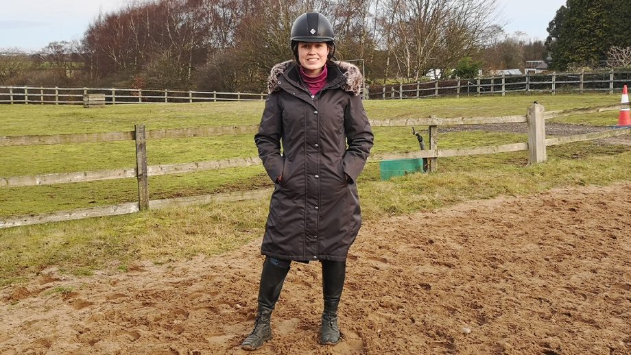 LeMieux Loire Waterproof Coat full length with hands in pockets