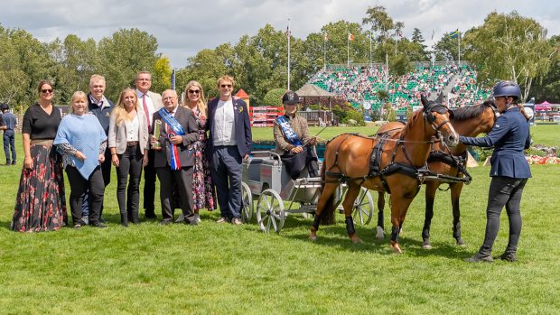 Jeff Osborne receives the Dorian Williams Trophy during the prize giving for the Osborne Refrigerators Double Harness Scurry Championship, won by his wife Alison.
