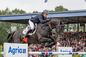 Robert Whitaker and his father John Whitaker's home-bred Vermento win the Longines King George V Gold Cup showjumping competition at the Longines Royal International Horse Show at Hickstead on Sunday 30 July