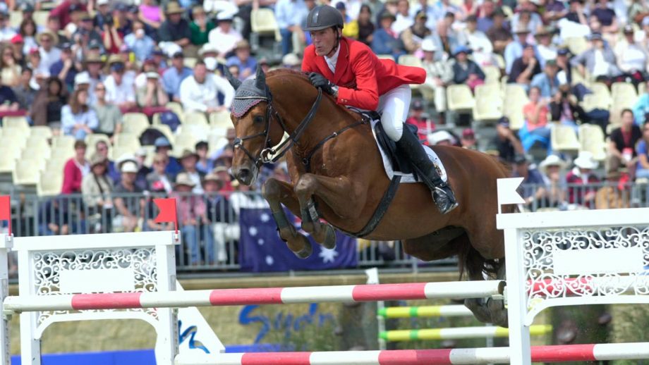 Ludger Beerbaum and Goldfever competing at the 2000 Olympic Games in Sydney, where they helped Germany win team gold.