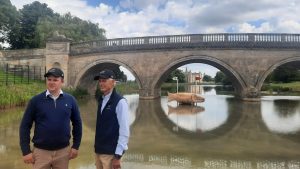 Defender Burghley Horse Trials director Martyn Johnson with course-designer Derek di Grazia pictured on the cross-country course ahead of the 2023 event.