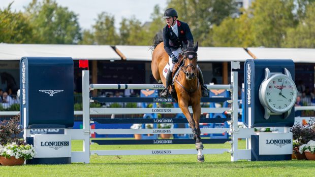 Harry Charles and Casquo Blue in action at the European Showjumping Championships in Milan, Italy
