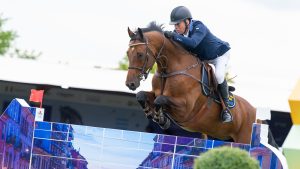 Jens Fredricson and Markan Cosmopolit have jumped three clears to lead the European Showjumping Championships in Milan, Italy