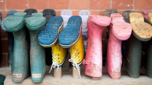 The best childrens wellington boots hung on boot stand