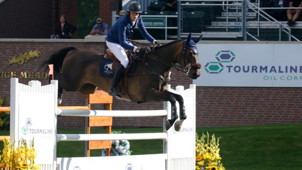 Martin Fuchs and Commissar Pezi pictured in the first round of the 1.60m Tourmaline Oil Cup at Spruce Meadows