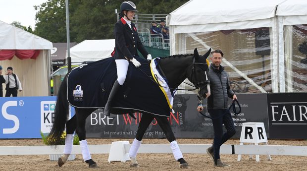 Mari Durward-Akhurst and Athene Lindebjerg at the National Dressage Championships, with Rob Waine.