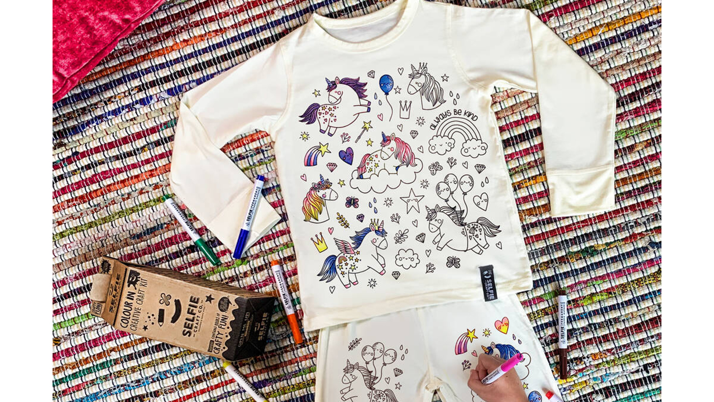 Personalised Unicorn Colour In Pyjamas With Pens
