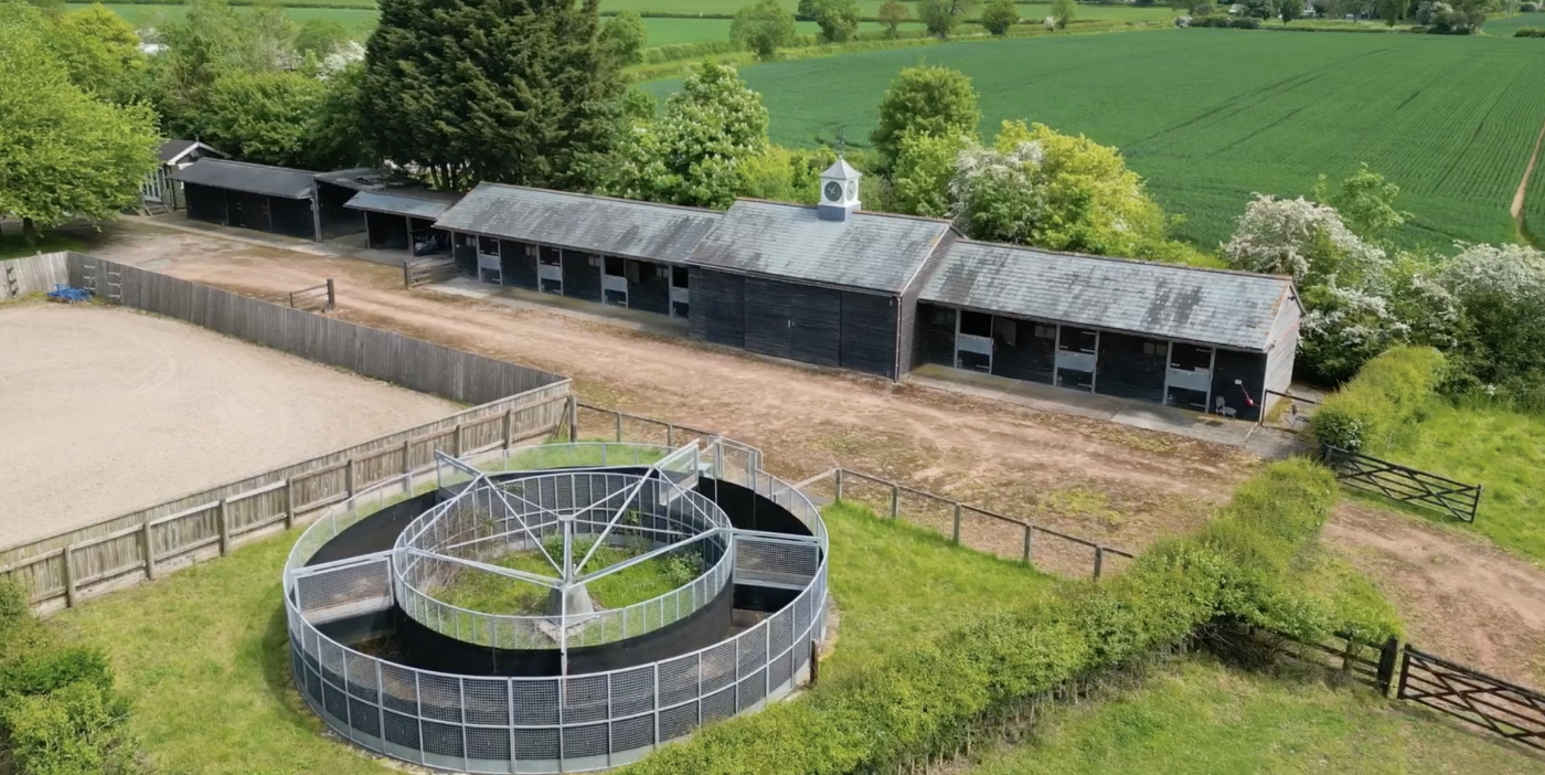 A phenomenal house with 15 stables, enviornment and horsewalker, set in over 30 acres