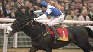 Norman Williamson on Alderbrook crosses the finishing line to win the Champion Hurdle Trophy at the 1995 Cheltenham Festival for trainer Kim Bailey.