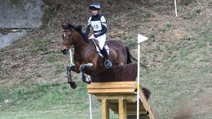 New Zealand eventer Monica Spencer (pictured here at the World Championships with Artist) has moved to the United States in her pursuit of a place at the Paris 2024 Olympics.