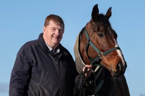 Irish trainer Shark Hanlon with £800 purchase Hewick, who is now bidding for Cheltenham Gold Cup and Aintree Grand National glory.