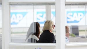 Dressage judges sitting in a judges box