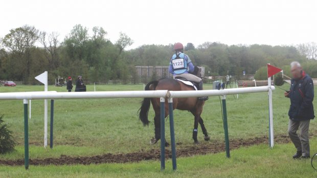 A rider rides our of the cross-country start box.