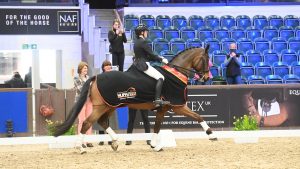 Jo Thurman-Baker and Sol Invictus win the Freestyle Advanced Medium Gold at the Winter Dressage Championships 2024