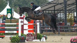 Nicole Lockhead Anderson and Mecoblue PS win the LeMieux National 1.40m at Royal Windsor Horse Show.