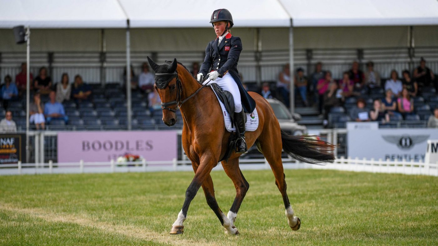 Reigning Badminton champion takes the dressage lead on ‘quality’ but spooky ride