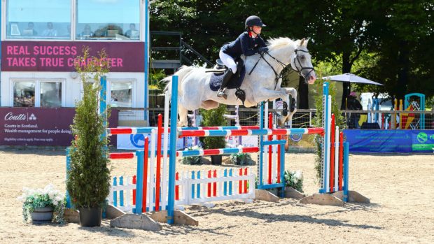 Pictured Aimee Paxton and Las Vegas VI winning the 148cm championship for the third consecutive year at the Royal Highland Show.