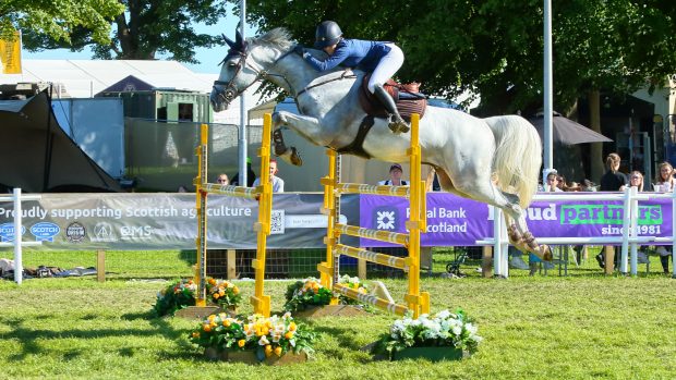 Young showjumper Millie Lawson and Calatis, pictured, winning the the Wright, Johnston & Mackenzie RHS Young Masters Championship at the Royal Highland Show.