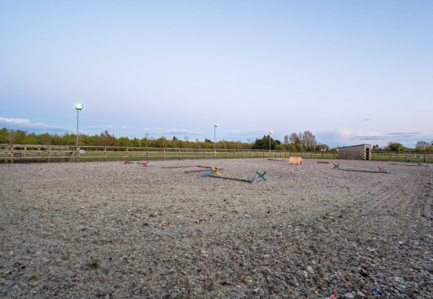 A well-presented family home with stables, arena, 10 acres, gym, home ...