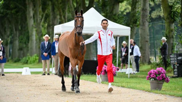 Alex Hua Tian and Jilsonne Van Bareelhof in the trot-up ahead of the Olympic eventing dressage phase at Paris 2024.