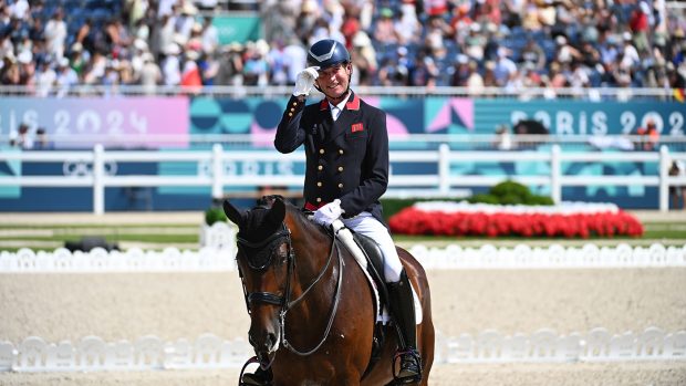 Carl Hester and Fame after their grand prix at the Paris Olympics