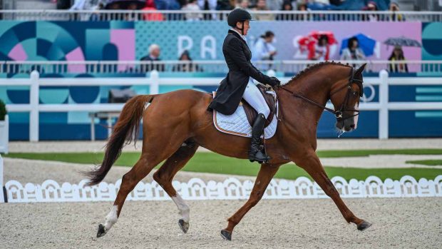 Karin Donckers and Leipheimer Van’t Verahof in the eventing dressage at the Paris Olympic Games.