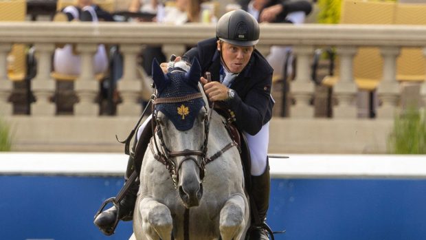 Matt Sampson and Daniel win the CSI5* grand prix at Spruce Meadows.