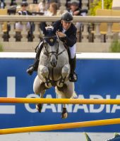 Matt Sampson and Daniel win the CSI5* grand prix at Spruce Meadows.