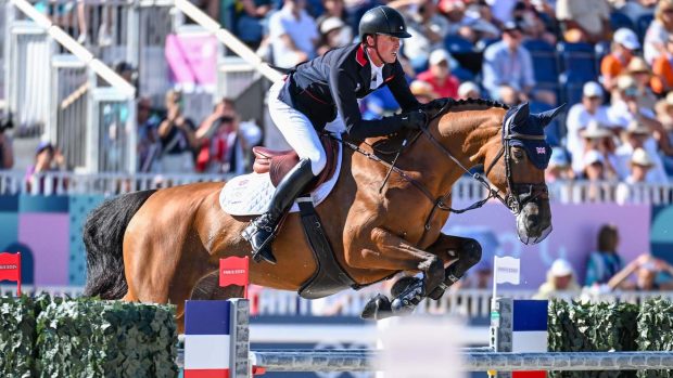 How to watch the European Showjumping Championships on TV: Ben Maher and Dallas Vegas Batilly jumping at the Paris Olympics.