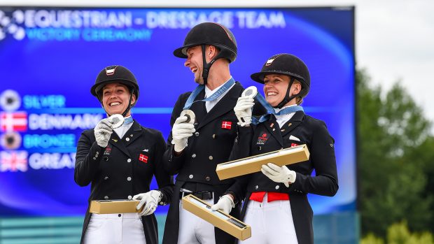 Olympic dressage team medals The Danish team celebrate silver at the Paris Olympics