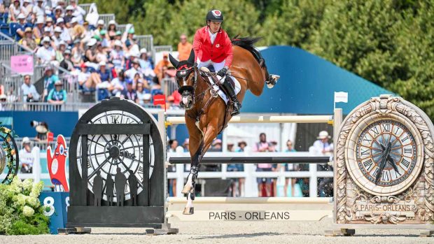 Eiken Sato riding Conthargo-Blue at the Olympic showjumping team qualifier
