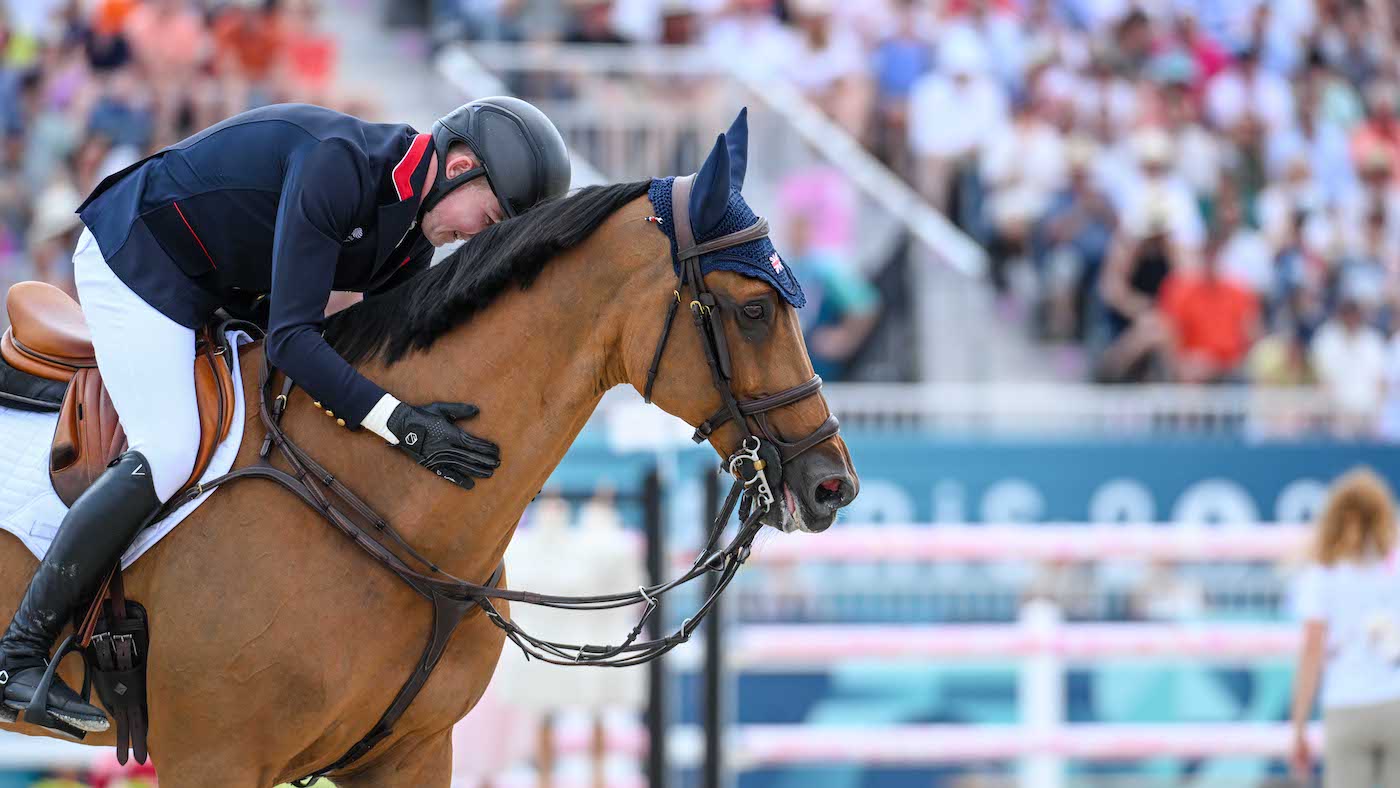 Peter and Harry Charles talk after Olympic showjumping gold medal