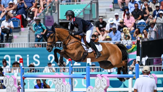 Harry Charles and Romeo 88 jumping in the individual qualifier at the Paris Olympics