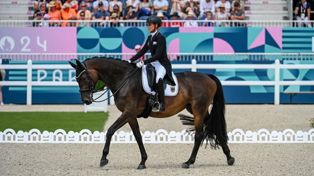 Jessica von Bredow Werndl and SF Dalera BB in their grand prix test at the Paris Olympics.