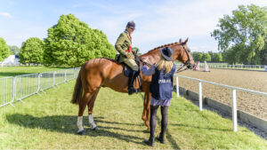 H&H’s current showing editor Alex Robinson carrying out an interview at Royal Windsor Horse Show in 2022.