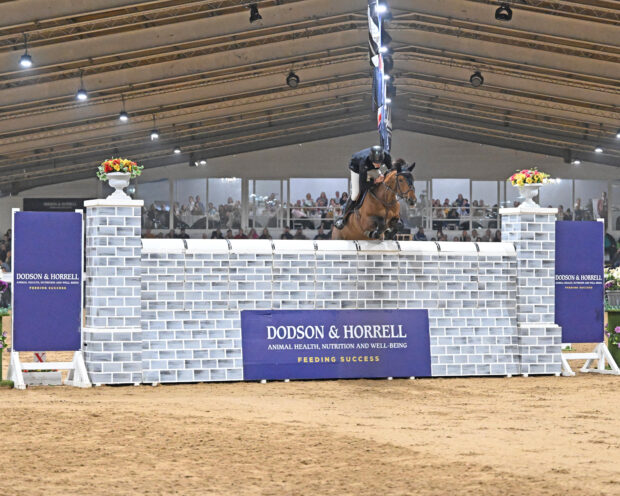 Carmen Edwards and Happy Valerie win the Arena UK puissance.