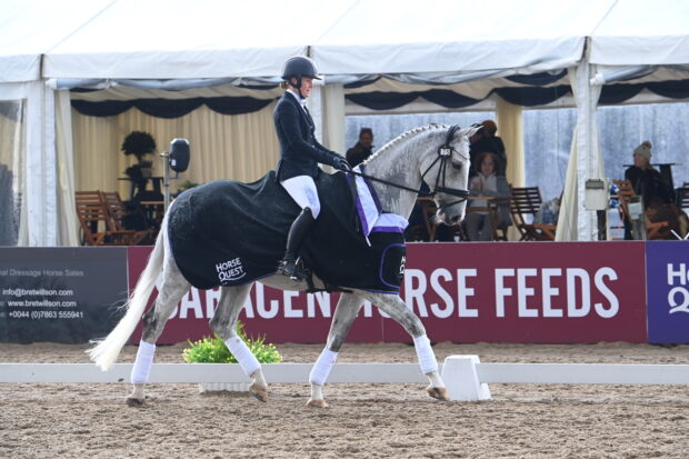 Amy Foulstone and her own Irish-bred HHS Sterling in the prizegiving after winning the elementary silver at the National Dressage Championships.