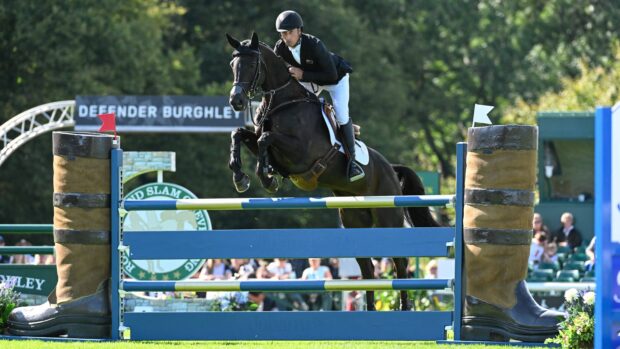 Tim Priceon his way to a single rail down with Vitali in the Defender Burghley showjumping phase to finish second.
