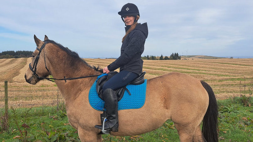 Becky Murray wearing the Ariat Valor 2.0 Waterproof Jacket
