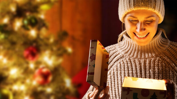 Women opening Christmas present